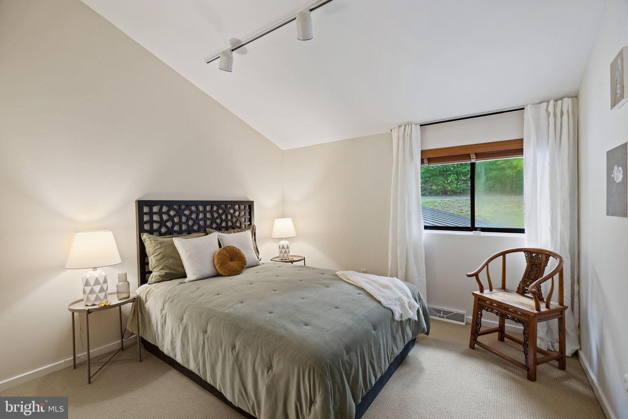 175 Old Gulph Road Wynnewood, PA 19096 - Photo 49 of 87 a bedroom with a bed and a window