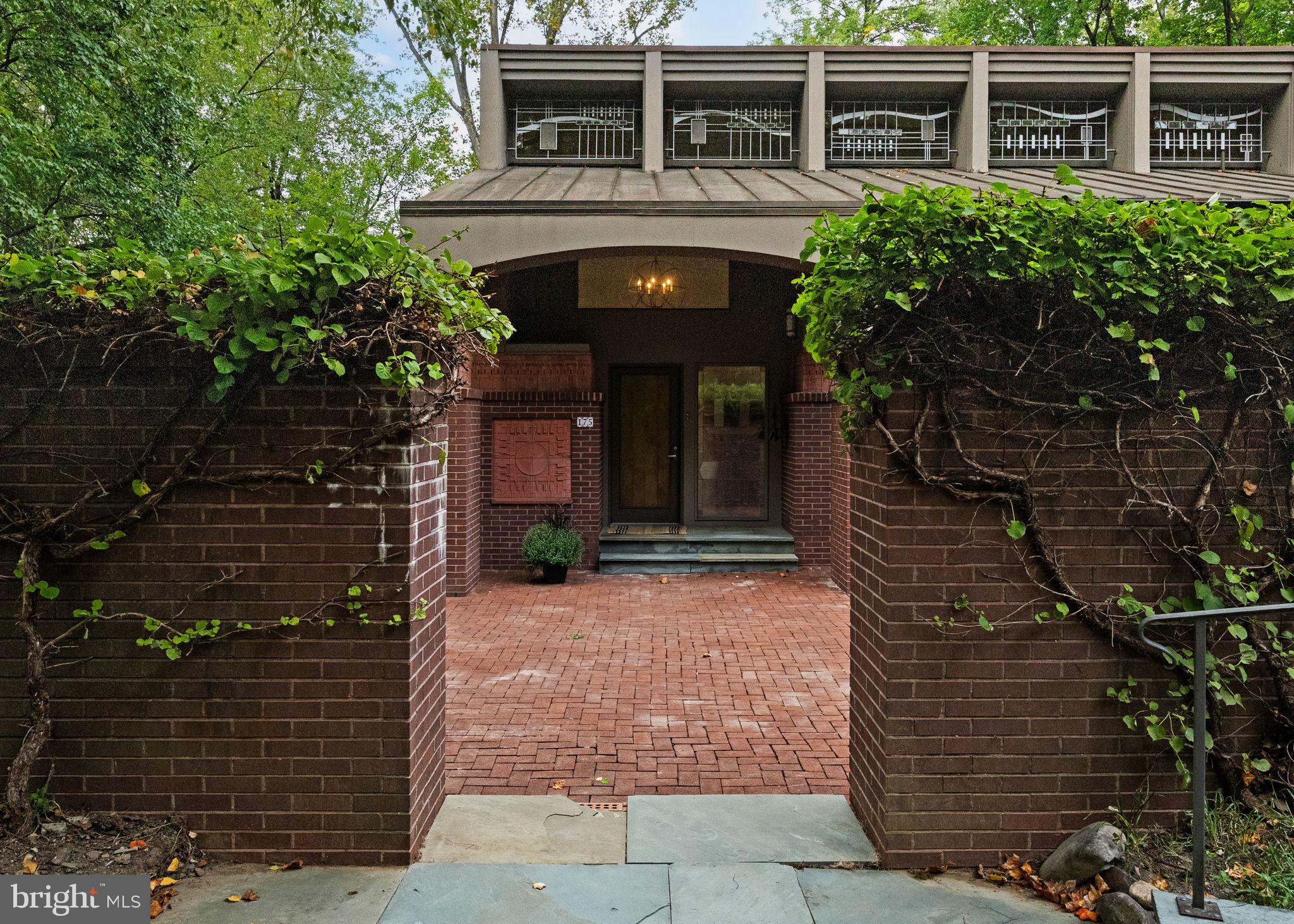 175 Old Gulph Road Wynnewood, PA 19096 - Photo 5 of 87 a front view of a house with garden