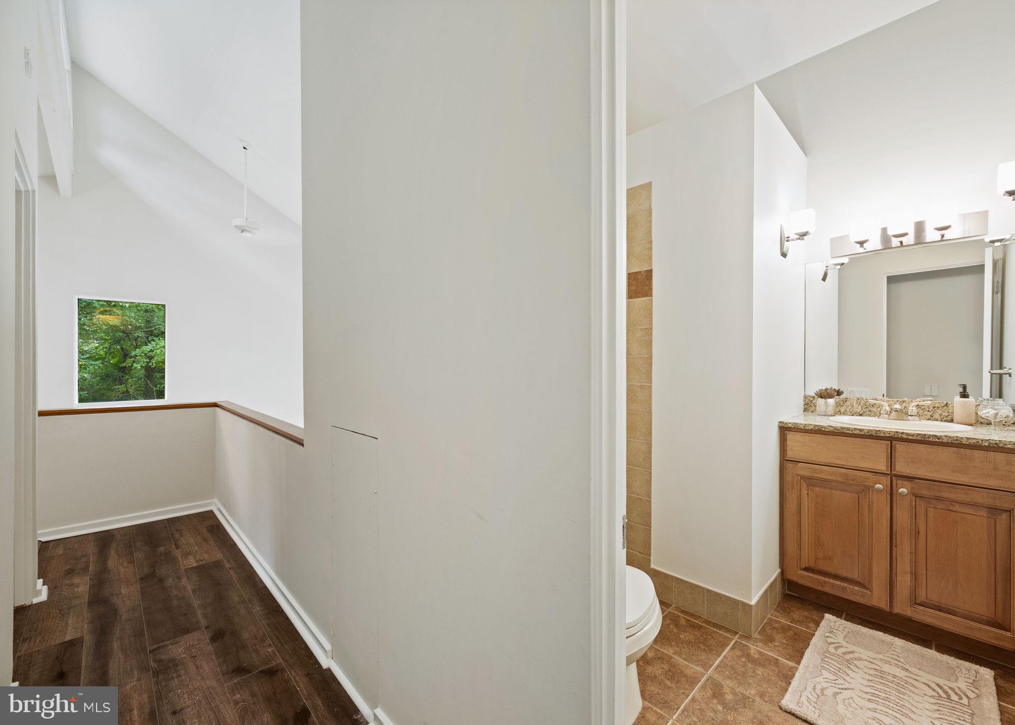 175 Old Gulph Road Wynnewood, PA 19096 - Photo 52 of 87 a bathroom with a sink and a mirror