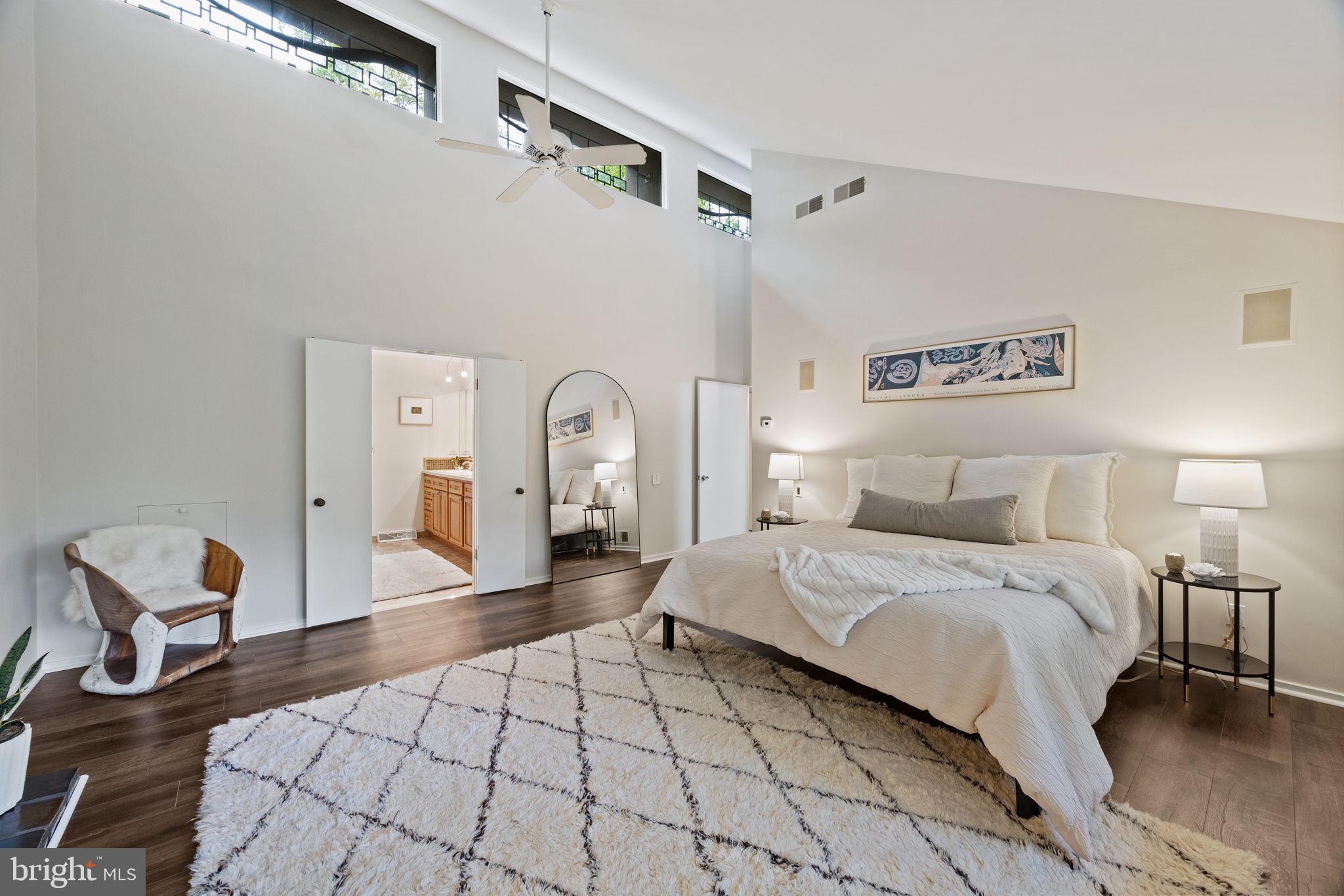 175 Old Gulph Road Wynnewood, PA 19096 - Photo 58 of 87 a bedroom with a bed and a mirror