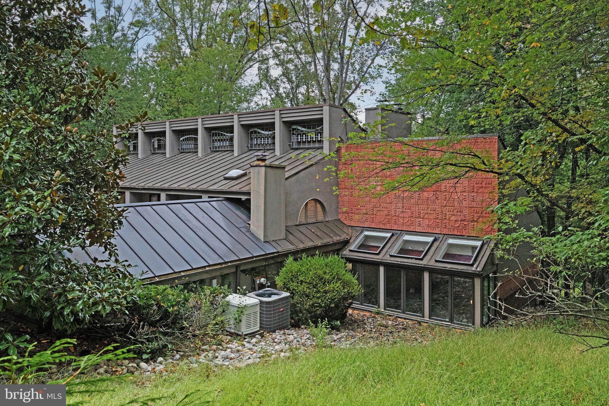 175 Old Gulph Road Wynnewood, PA 19096 - Photo 86 of 87 a aerial view of a house with a yard and sitting area