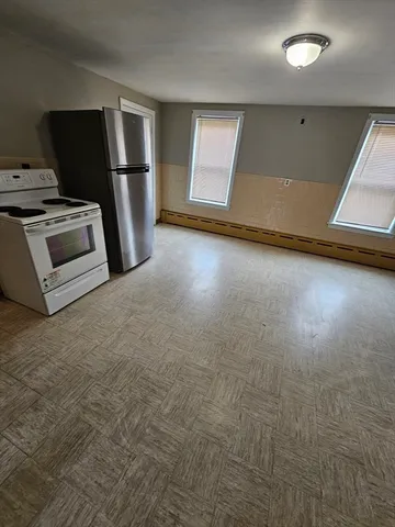 a view of a livingroom with furniture