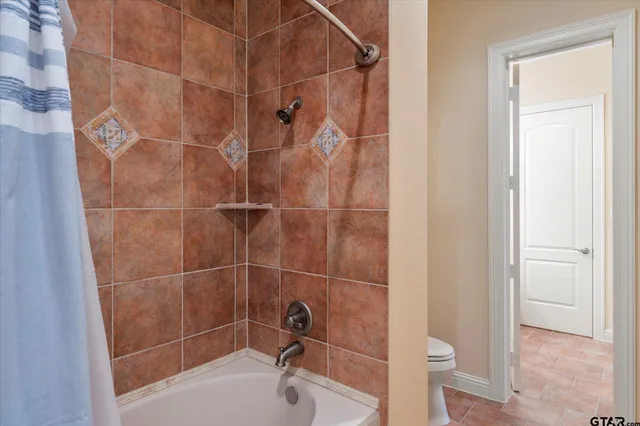 a view of an chairs and deck in the balcony