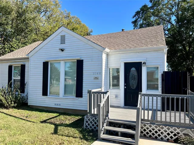 a front view of a house with balcony