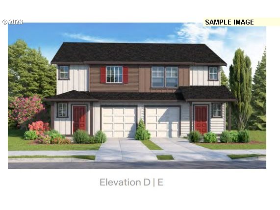 17532 Northwest 10th Place Ridgefield, WA 98642 - Photo 1 of 27 a front view of a house with a yard