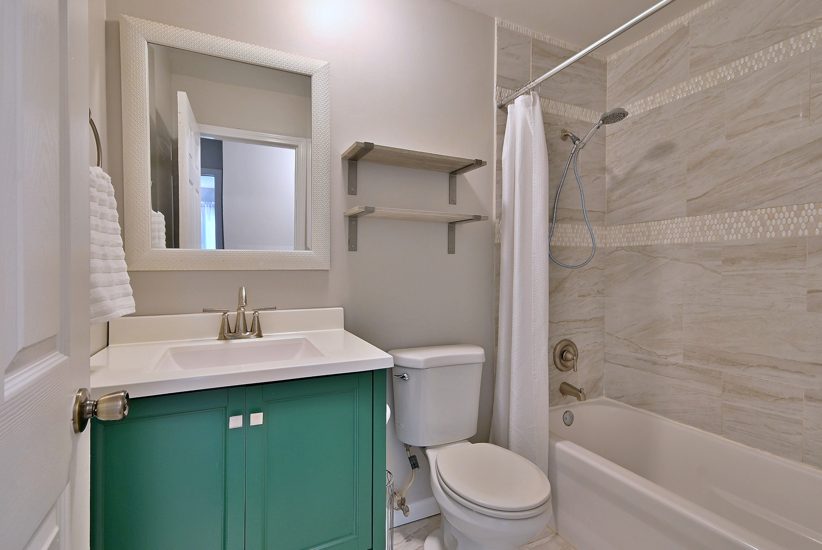5629 Crestwood Road Matteson, IL 60443 - Photo 15 of 20 a bathroom with a sink toilet and shower