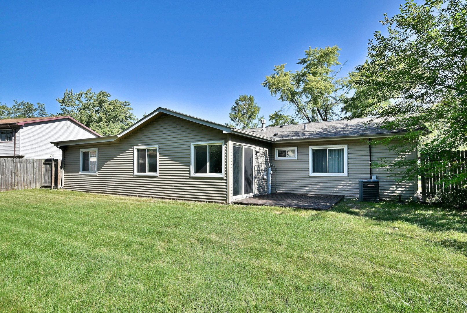 5629 Crestwood Road Matteson, IL 60443 - Photo 19 of 20 a front view of house with yard and green space