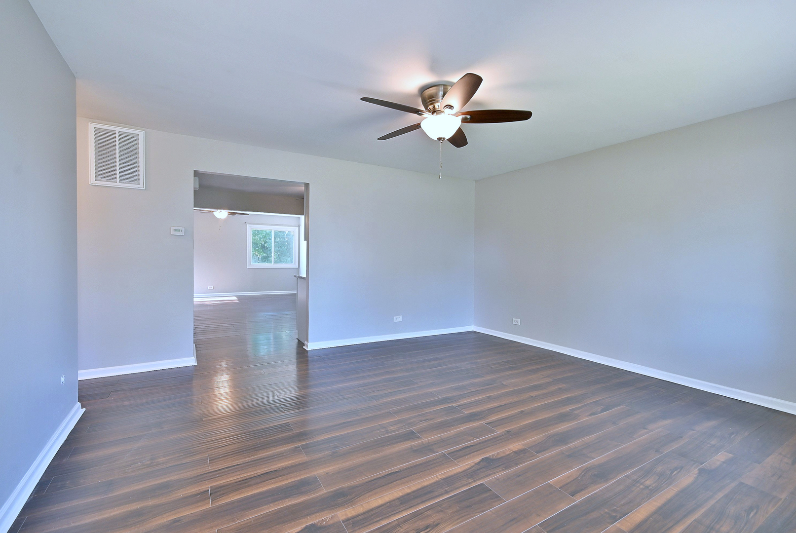 5629 Crestwood Road Matteson, IL 60443 - Photo 2 of 20 a view of empty room with wooden floor
