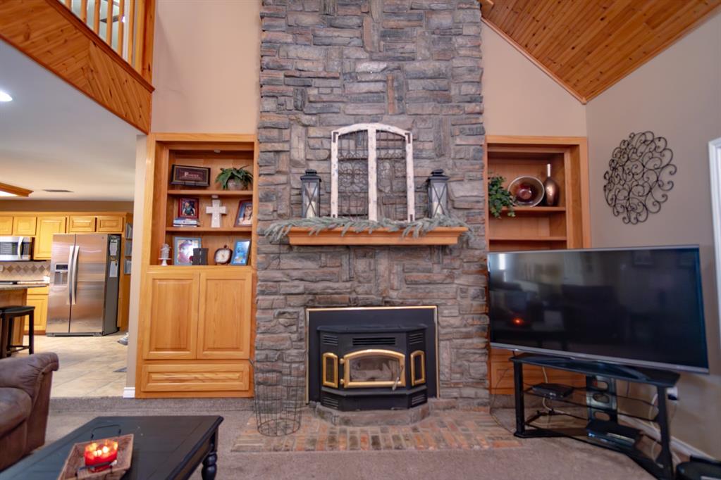 733 Ridgeview Drive Sherman, TX 75090 - Photo 12 of 40 a living room with furniture and a fireplace