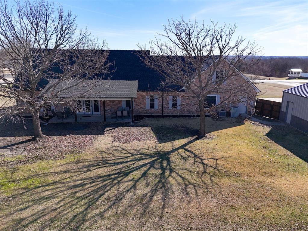 733 Ridgeview Drive Sherman, TX 75090 - Photo 3 of 40 a view of a house with snow on the road