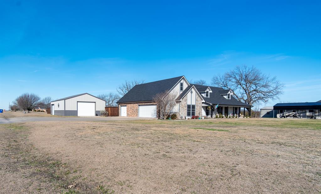 733 Ridgeview Drive Sherman, TX 75090 - Photo 4 of 40 a front view of a house with a yard