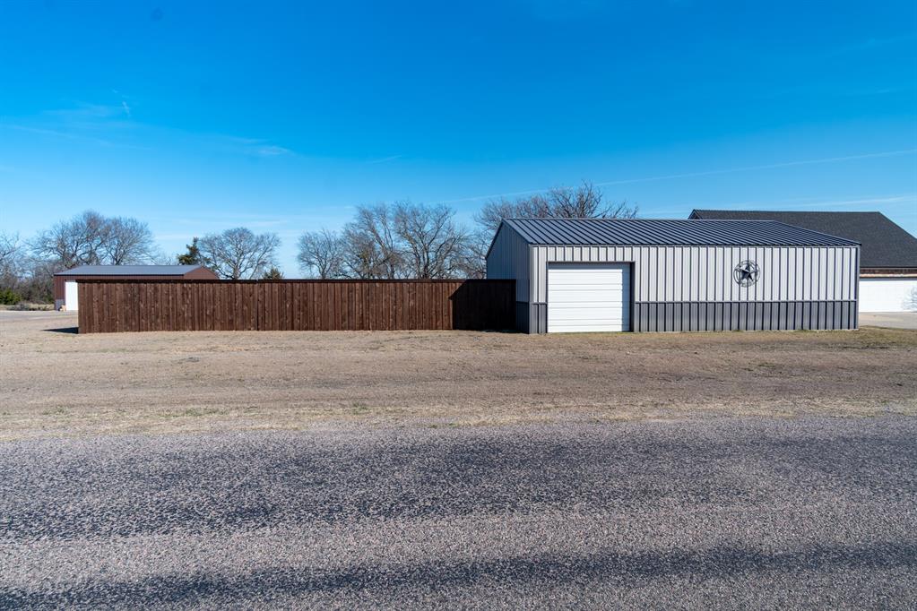 733 Ridgeview Drive Sherman, TX 75090 - Photo 7 of 40 a view of a house with a yard