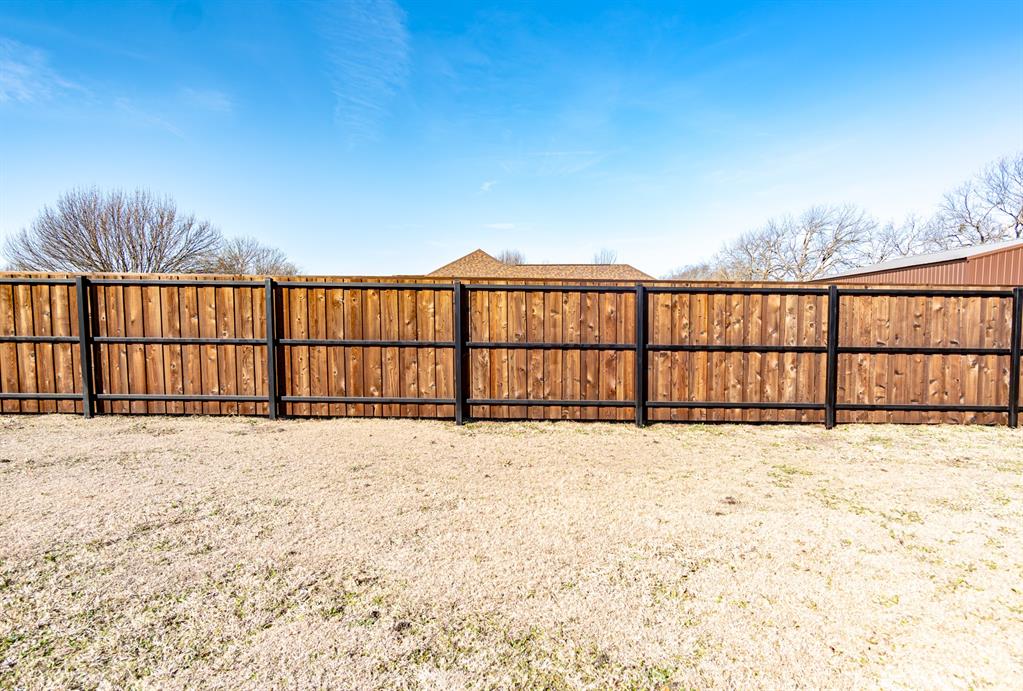 733 Ridgeview Drive Sherman, TX 75090 - Photo 9 of 40 a view of wooden fence