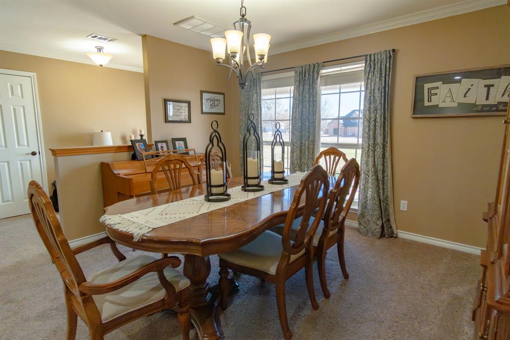 733 Ridgeview Drive Sherman, TX 75090 - Photo 10 of 40 a view of a dining room with furniture window and outside view