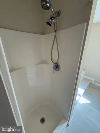 a bathroom with a bath tub