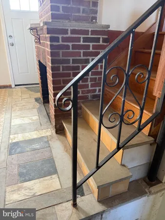 a white refrigerator freezer sitting inside of a kitchen
