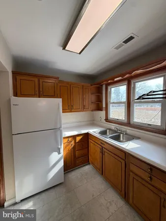 a room with a bed and a window