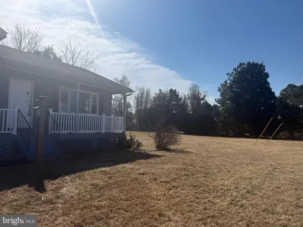 a front view of house with yard