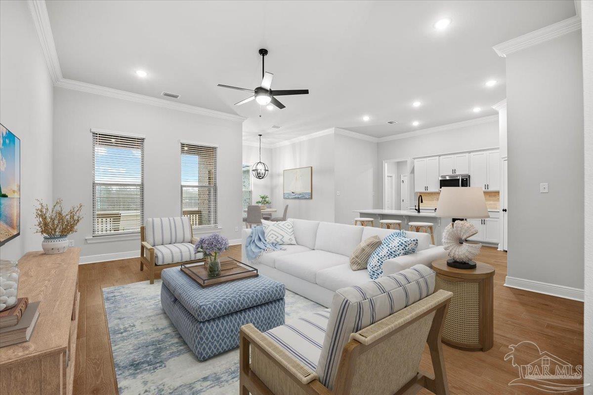 5362 Adeline Circle Pace, FL 32571 - Photo 1 of 40 a living room with furniture and a chandelier