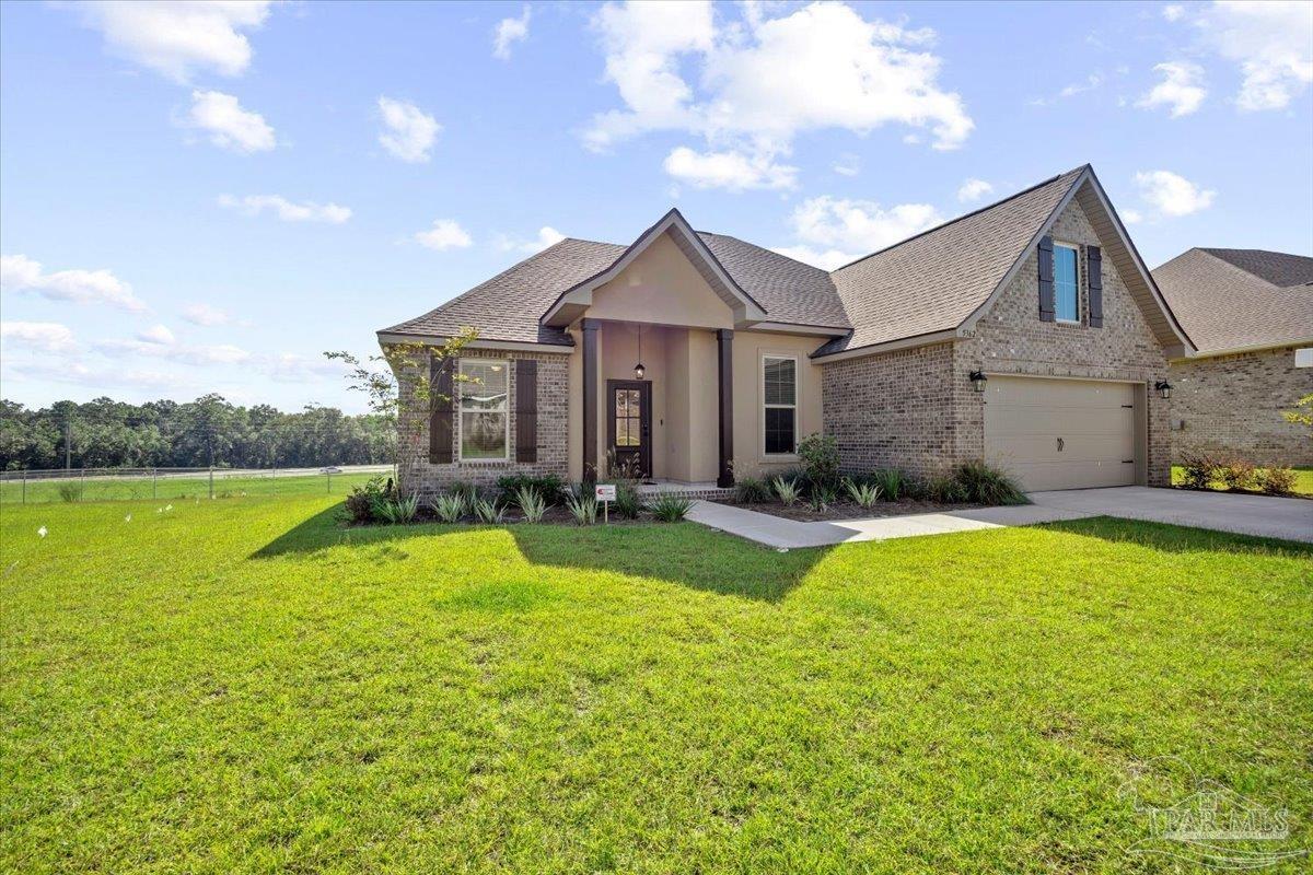 5362 Adeline Circle Pace, FL 32571 - Photo 32 of 40 a view of a house with swimming pool and a yard