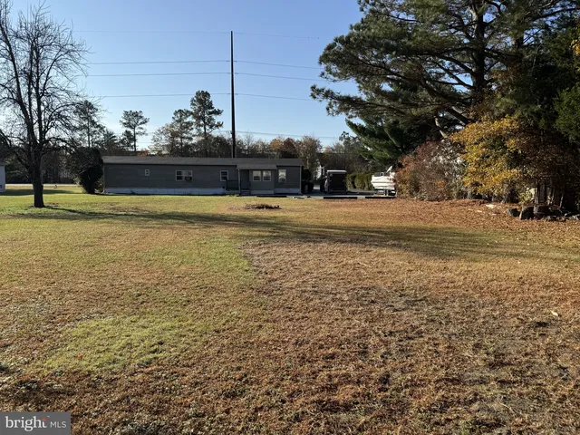 a view of a lake with a house
