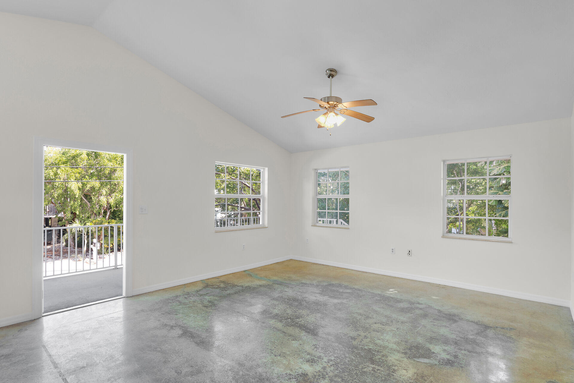 1018 Snapper Lane Key Largo, FL 33037 - Photo 17 of 24 a view of an empty room with a window