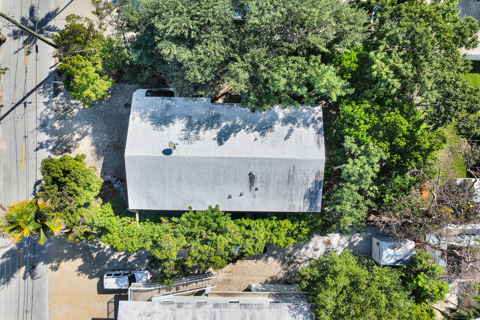 1018 Snapper Lane Key Largo, FL 33037 - Photo 24 of 24 an aerial view of a house with a yard