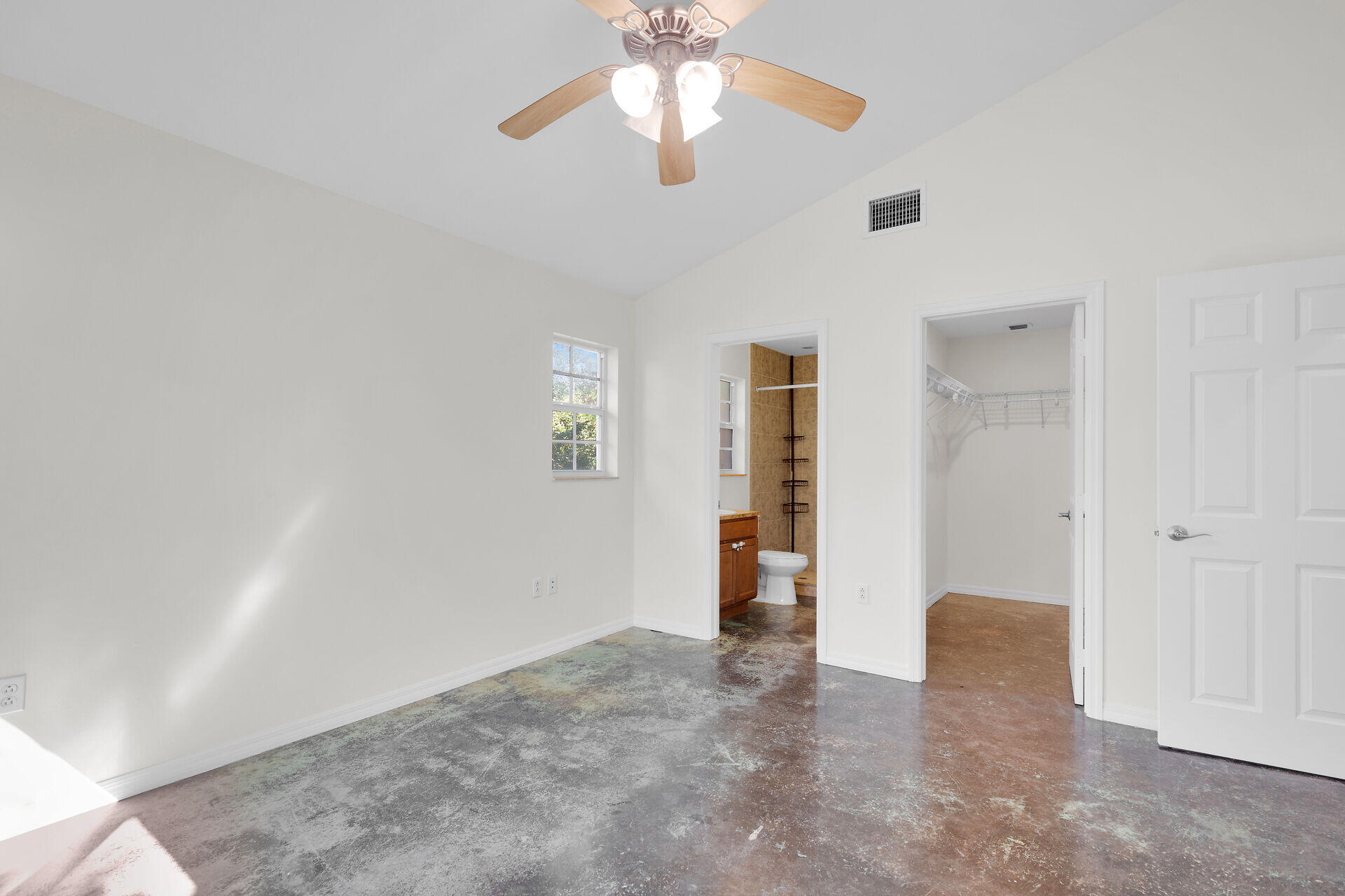 1018 Snapper Lane Key Largo, FL 33037 - Photo 6 of 24 a view of an empty room with a window