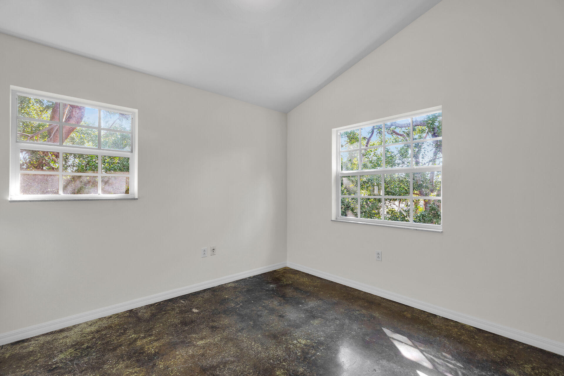 1018 Snapper Lane Key Largo, FL 33037 - Photo 9 of 24 an empty room with a window