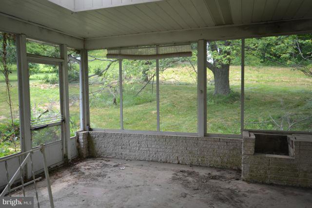 3326 Lineboro Road Manchester, MD 21102 - Photo 13 of 28 a view of porch with a floor to ceiling window