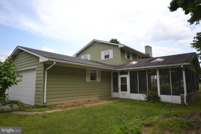 3326 Lineboro Road Manchester, MD 21102 - Photo 15 of 28 a front view of a house with a yard