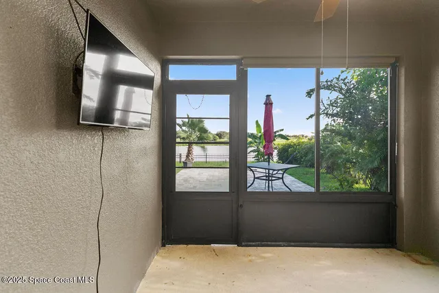 a view of a living room and window