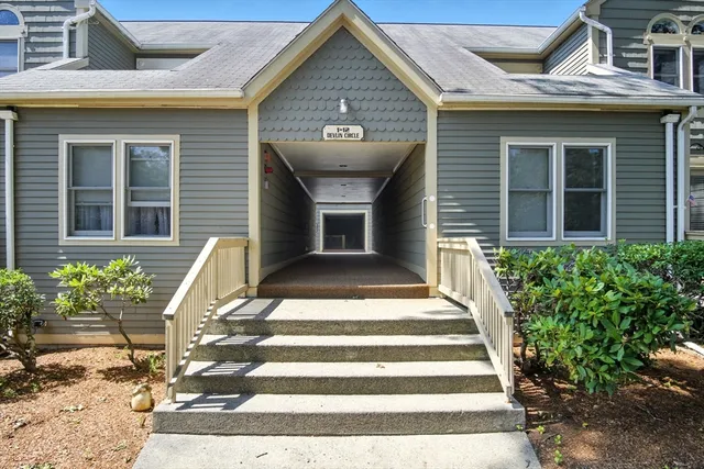 a front view of a house with a porch
