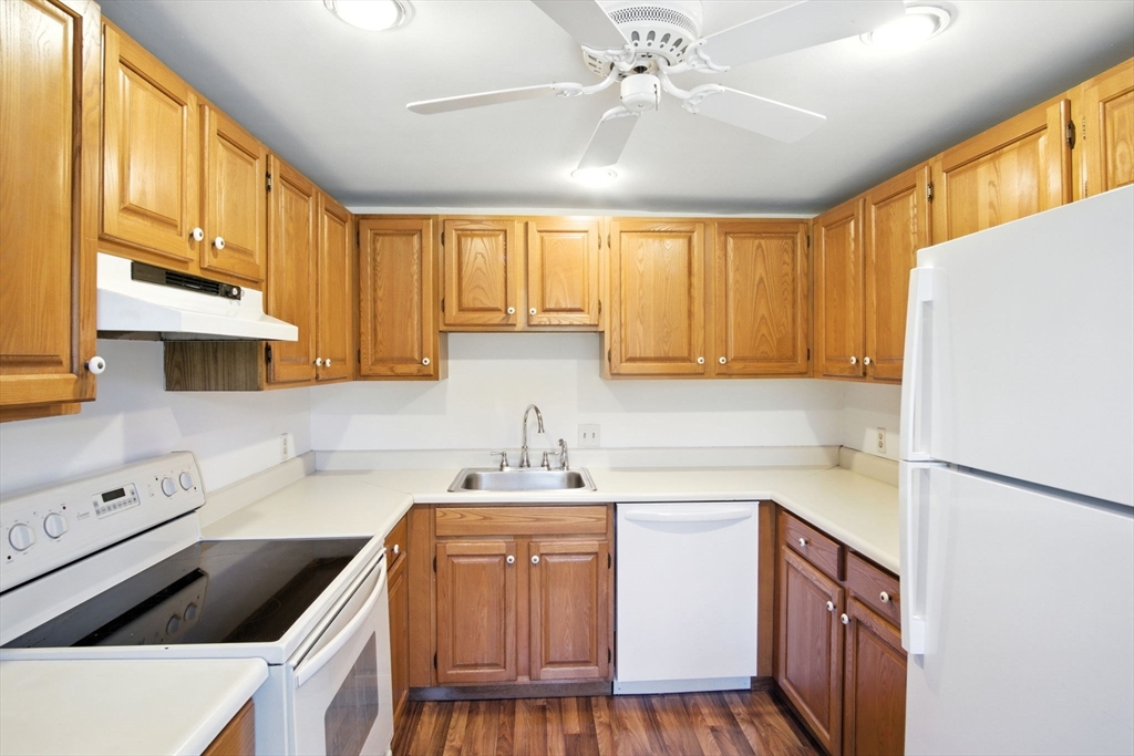 8 Devlin Circle, Unit 8 Blackstone, MA 01504 - Photo 12 of 38 a kitchen with a sink a stove cabinets and counter space