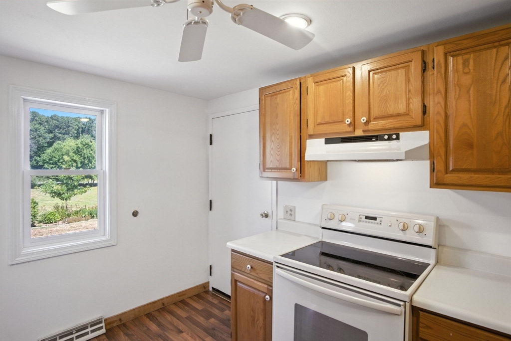 8 Devlin Circle, Unit 8 Blackstone, MA 01504 - Photo 14 of 38 a view of kitchen with wooden floor and electronic appliances