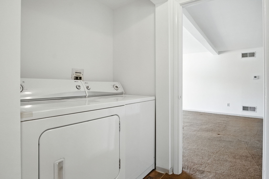 8 Devlin Circle, Unit 8 Blackstone, MA 01504 - Photo 20 of 38 a utility room with dryer and washer