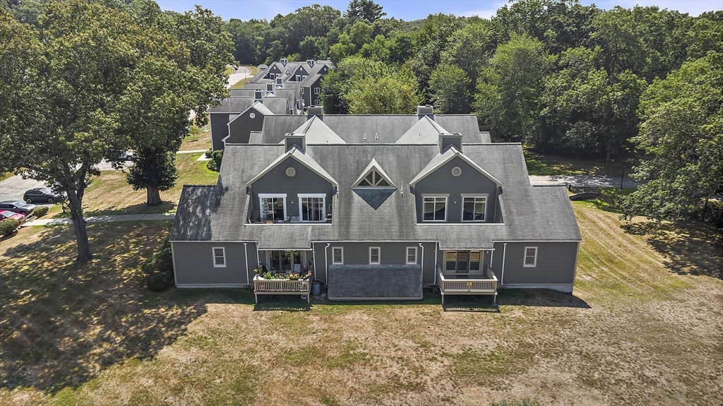 8 Devlin Circle, Unit 8 Blackstone, MA 01504 - Photo 29 of 38 a view of a house with a yard