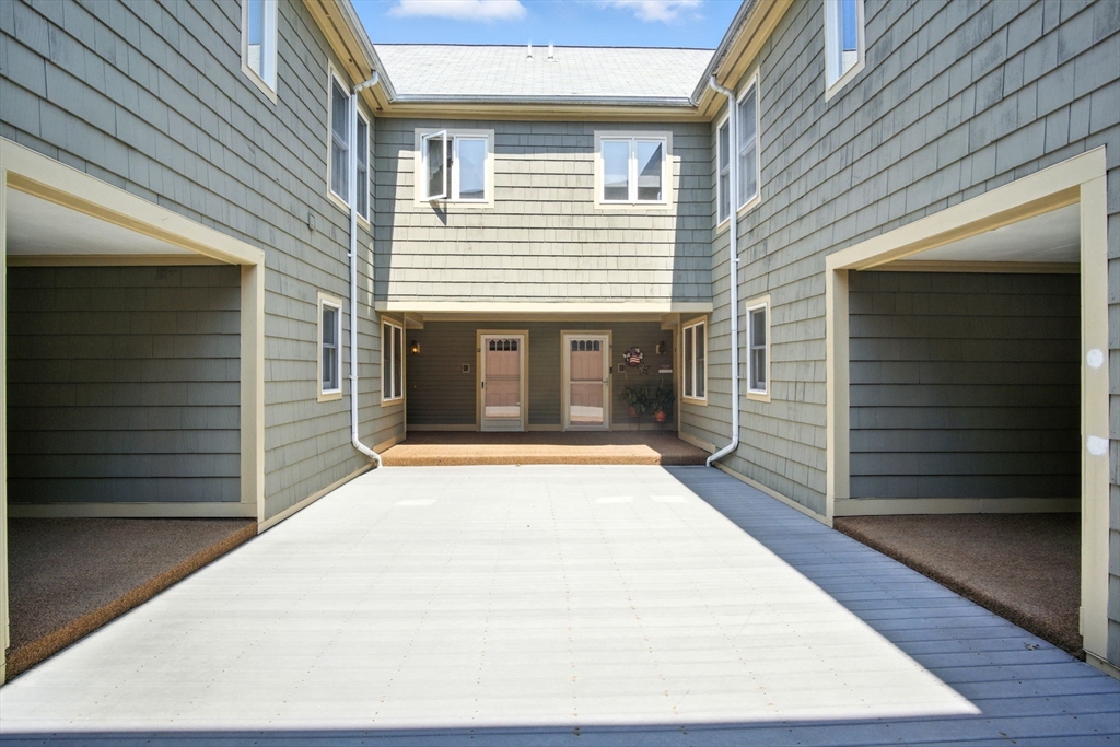 8 Devlin Circle, Unit 8 Blackstone, MA 01504 - Photo 33 of 38 a view of backyard with small cabin