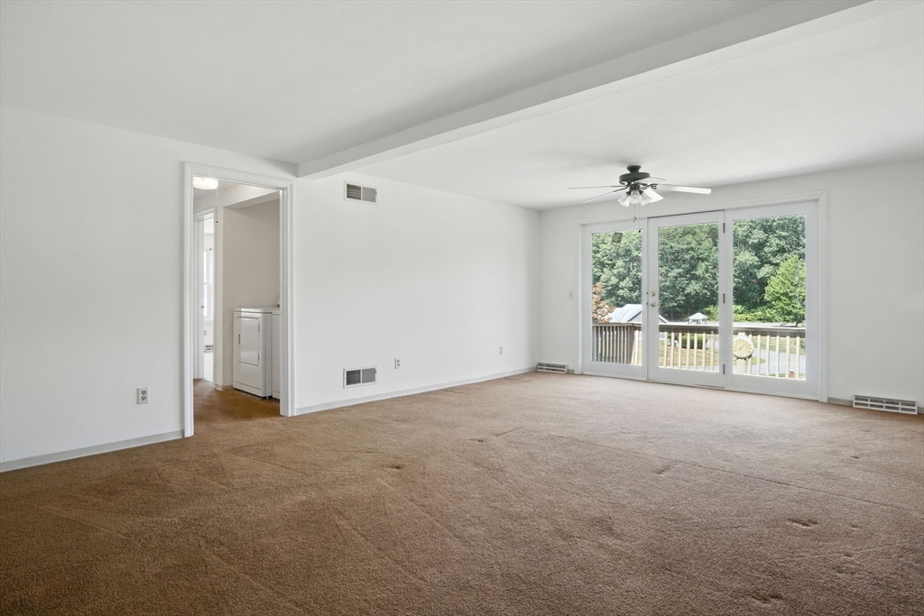 8 Devlin Circle, Unit 8 Blackstone, MA 01504 - Photo 5 of 38 a view of an empty room with a window
