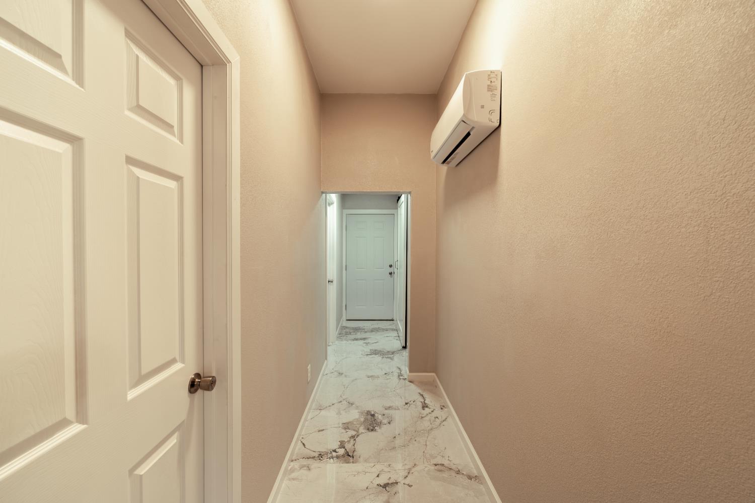 2320 K Street Merced, CA 95340 - Photo 11 of 25 a view of hallway with wooden floor