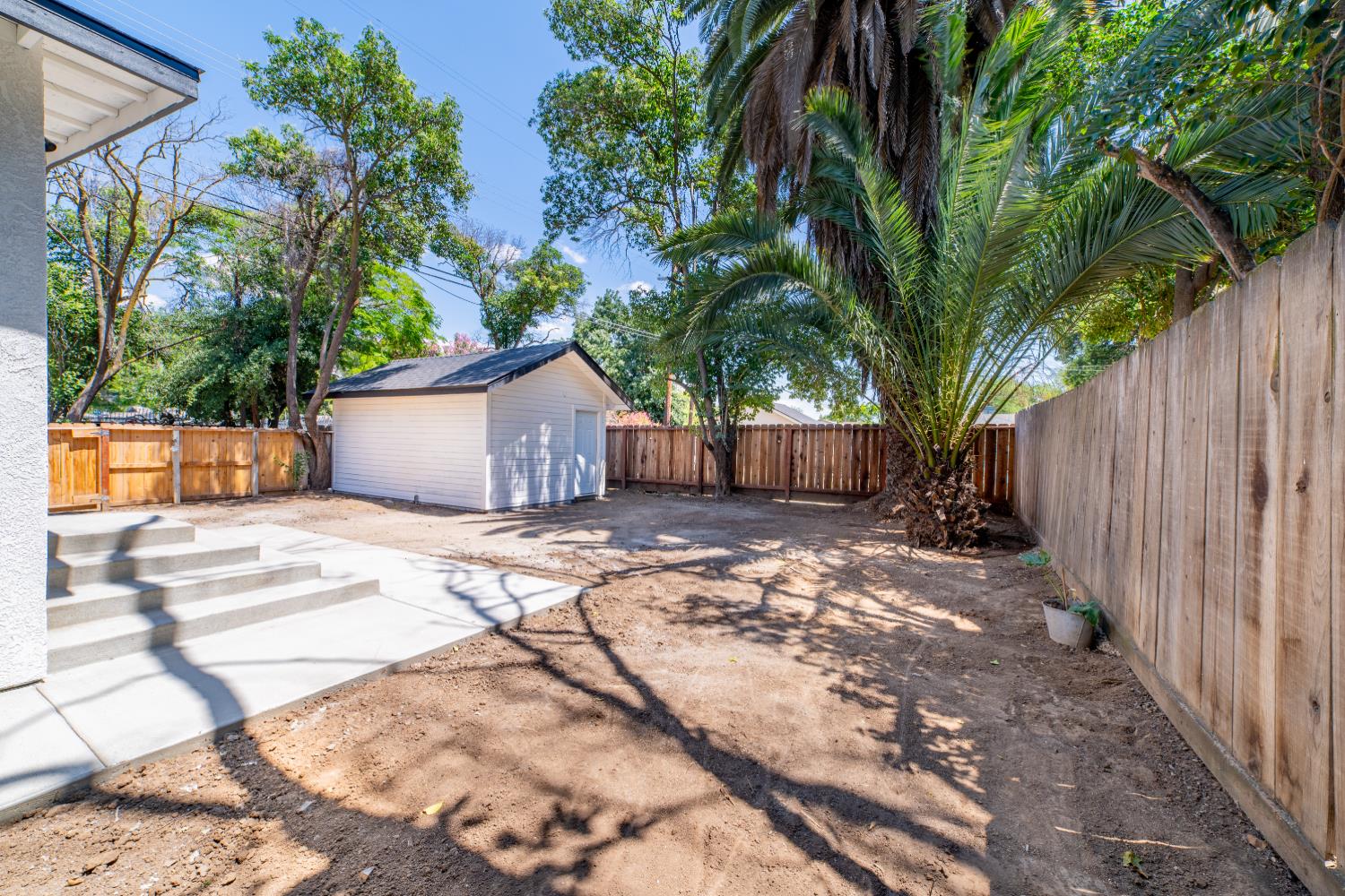 2320 K Street Merced, CA 95340 - Photo 20 of 25 a view of a house with backyard and sitting area