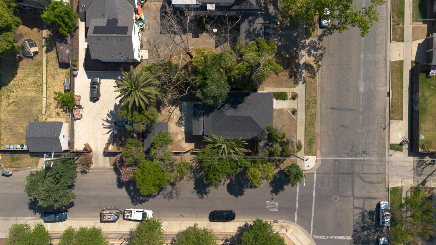 2320 K Street Merced, CA 95340 - Photo 24 of 25 an aerial view of a house with a yard and garden