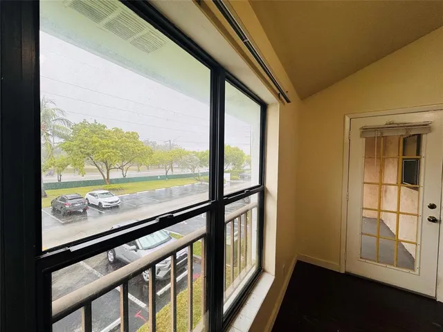 a view of an outdoor space with a large window