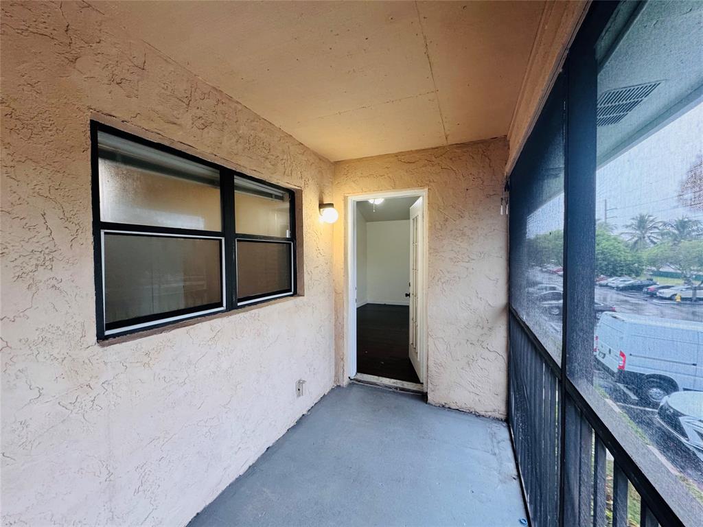 4090 North Pine Island Road, Unit 301 Sunrise, FL 33351 - Photo 7 of 16 a view of a garage