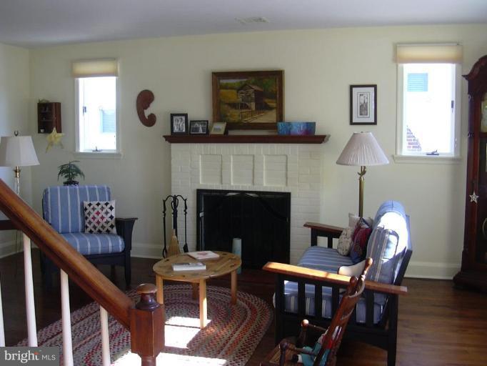 710 Murdock Road Baltimore, MD 21212 - Photo 2 of 18 Sunny living room with wood fireplace