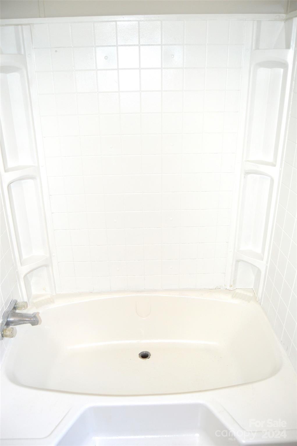613 West Lewis Ferry Road Statesville, NC 28677 - Photo 14 of 22 a bathroom with a bathtub