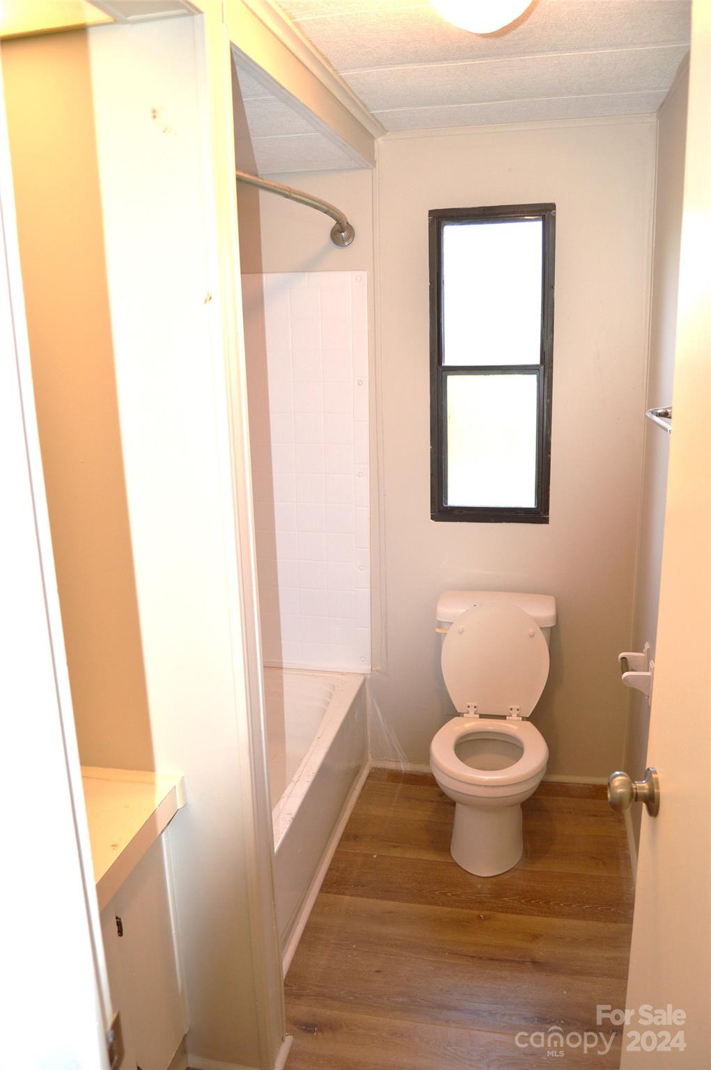 613 West Lewis Ferry Road Statesville, NC 28677 - Photo 15 of 22 a bathroom with a sink and a toilet