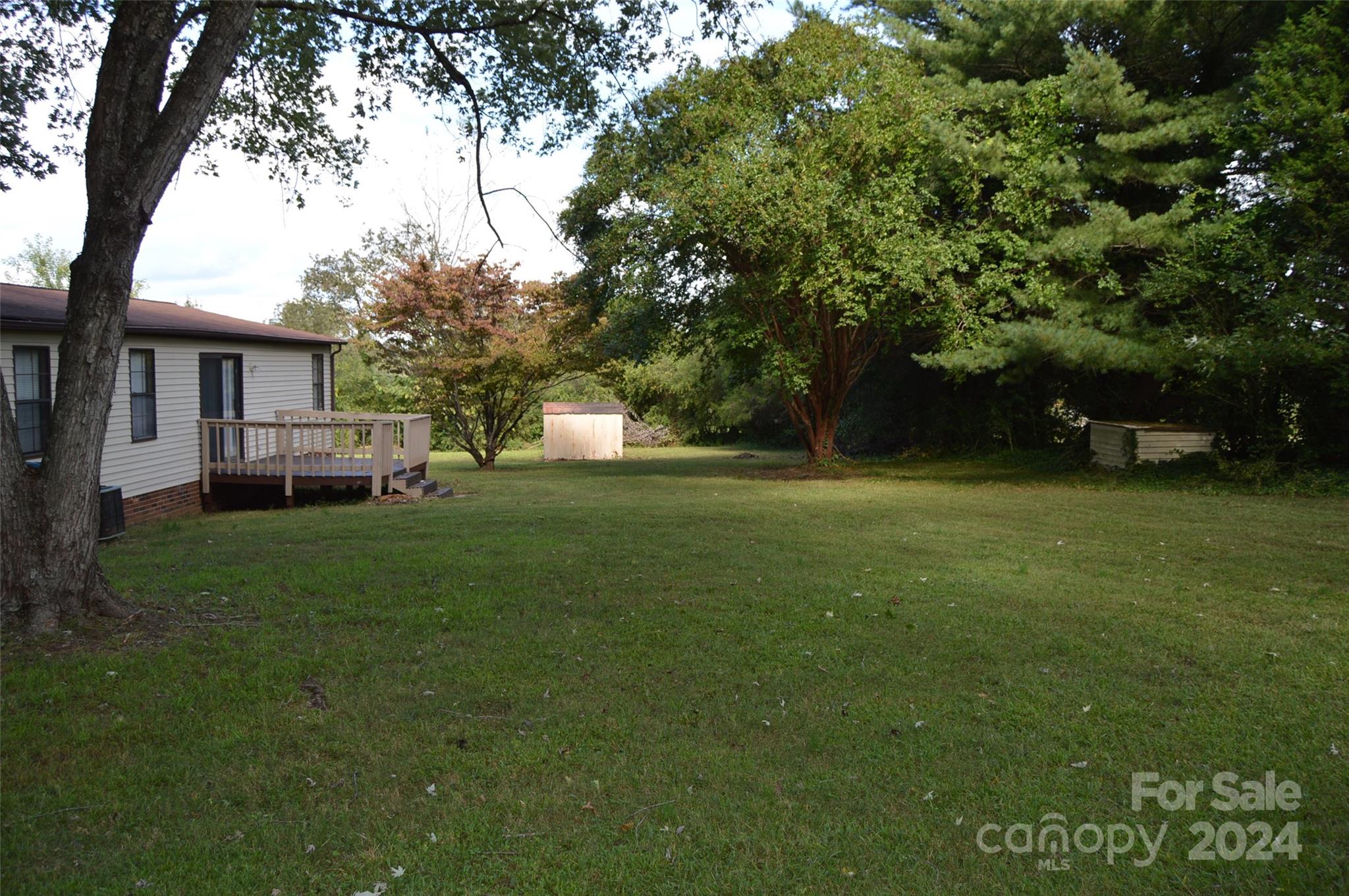 613 West Lewis Ferry Road Statesville, NC 28677 - Photo 21 of 22 a view of a house with a big yard