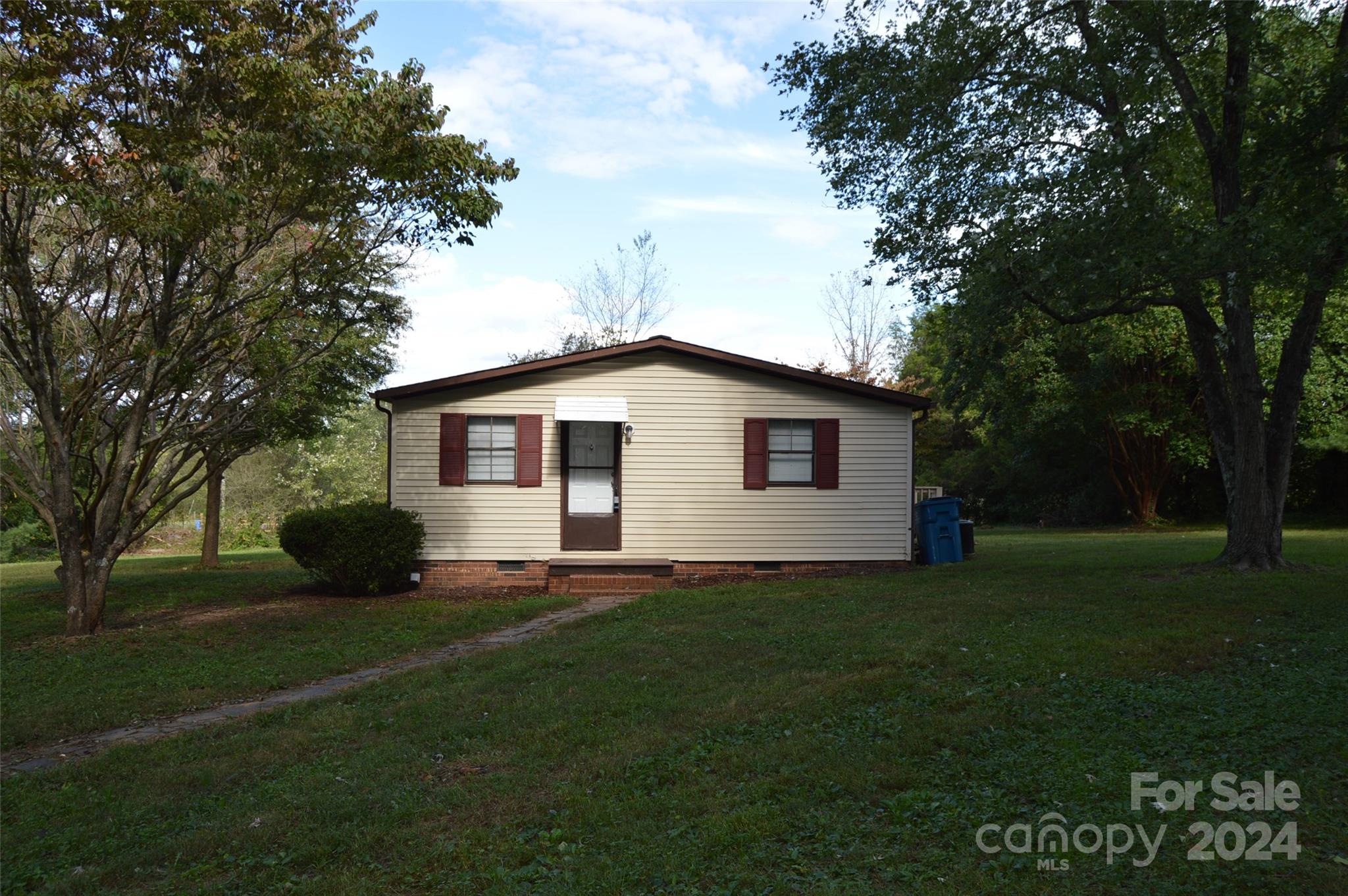 613 West Lewis Ferry Road Statesville, NC 28677 - Photo 22 of 22 a view of a house with a yard