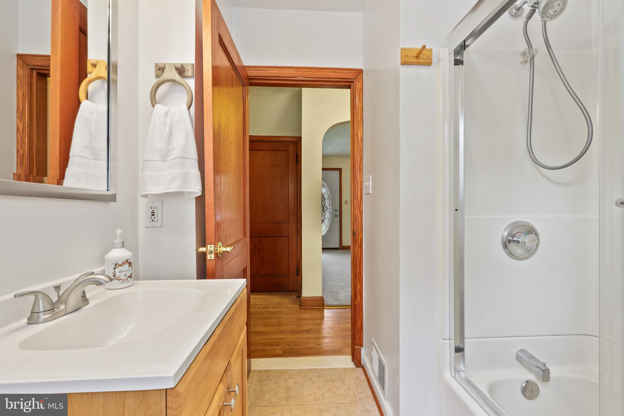 1058 Minnetonka Road Severn, MD 21144 - Photo 40 of 96 Tile flooring and tub surround & shower doors